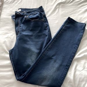 Kan Can skinny jeans. Light detail throughout thigh area, no distressing. 13/30